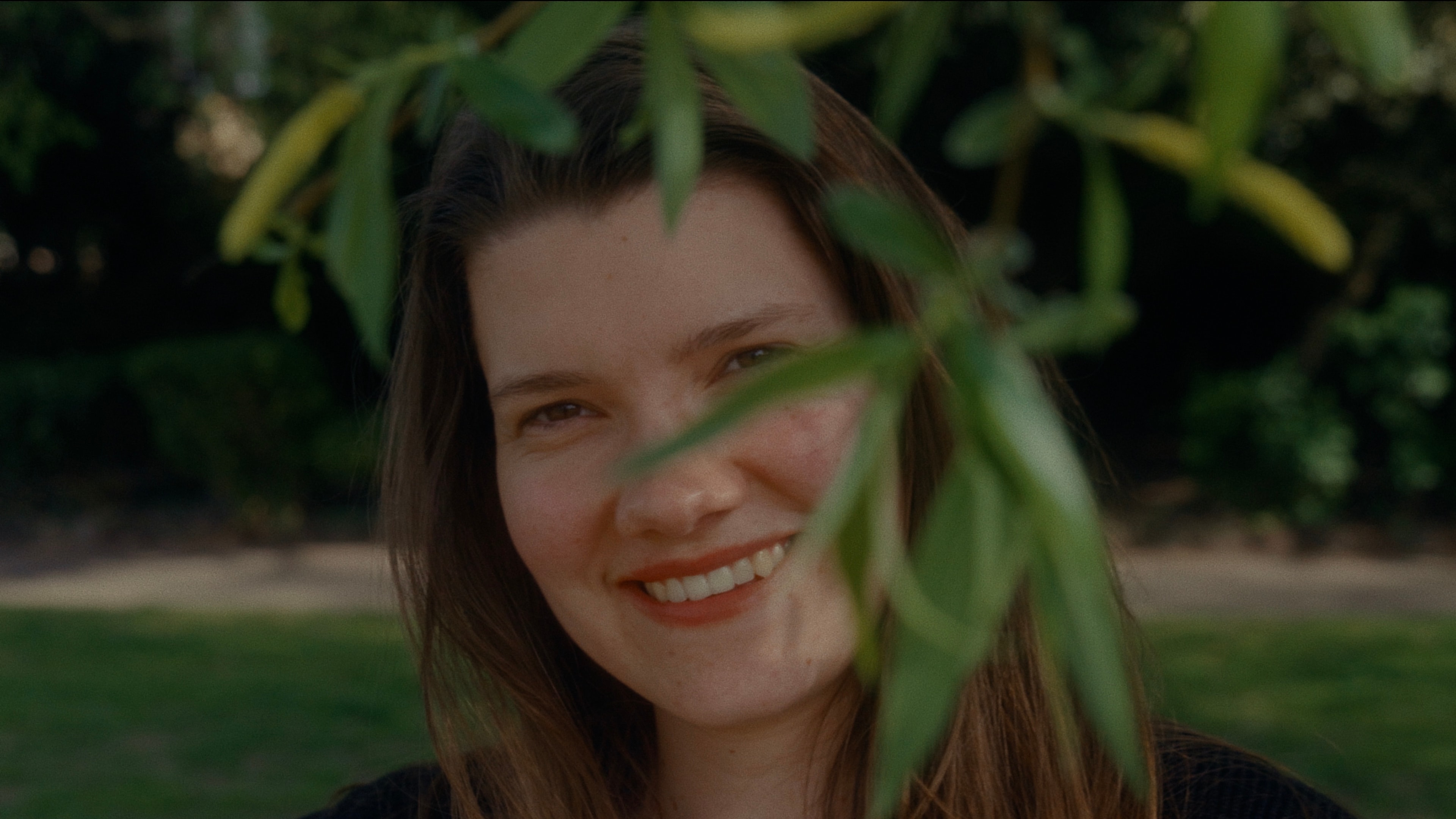 The same garden portrait frame graded with Aura